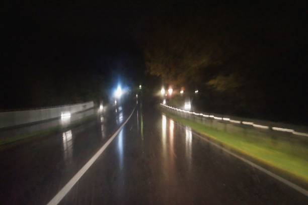 istock Driving through the city at a rainy night 1282793891
