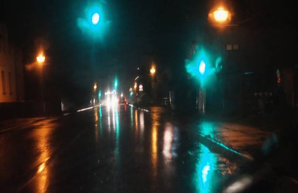 istock Driving through the city at a rainy night 1282794058
