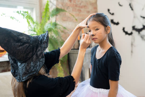 istock Making kitty makeup to Asian girl 1282796967