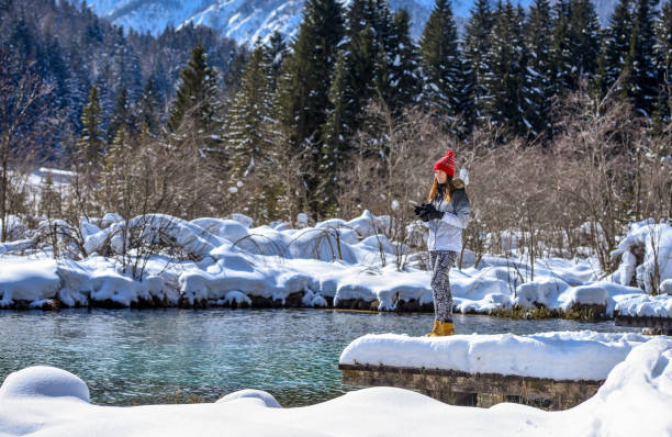 istock Photographer taking photos near spring lake 1282800988