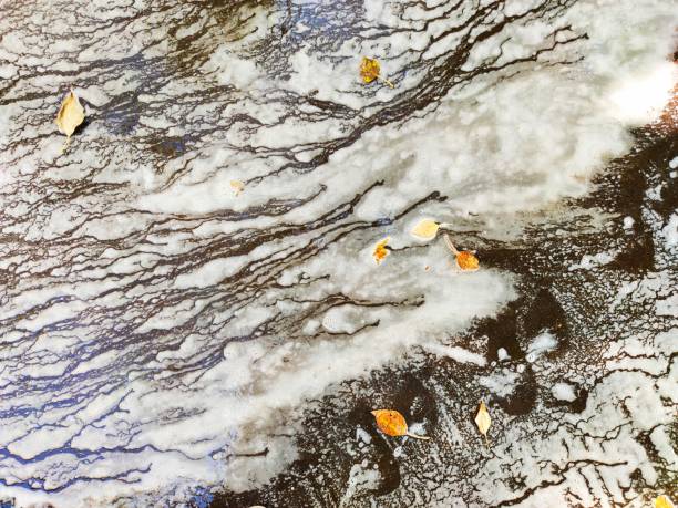 istock Abstract blur of water with foam along the road surface . 1282802697