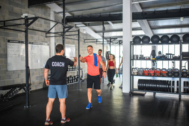 istock Diverse Group of Athletes Arriving at Gym for Workout 1282804419