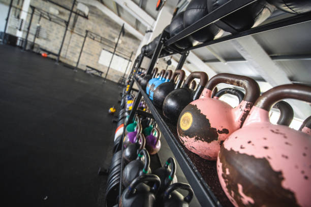 istock Exercise Equipment on Shelves in Modern Gym 1282804466