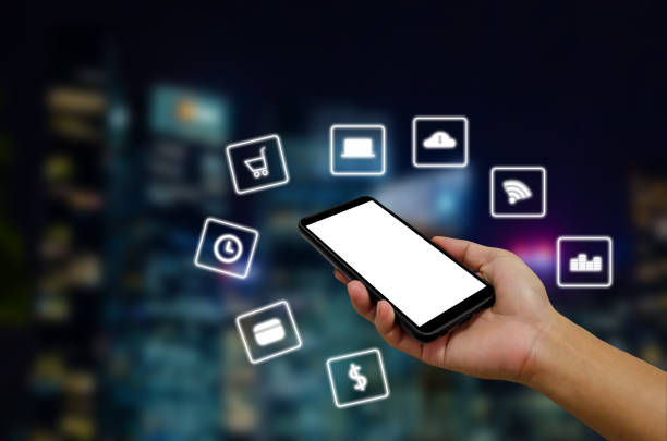 istock Hand holding smartphone with icons concept. 1282805554