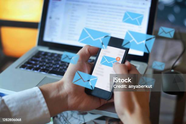 Email Marketing Concept Person Reading Email On Smartphone Stock Photo - Download Image Now