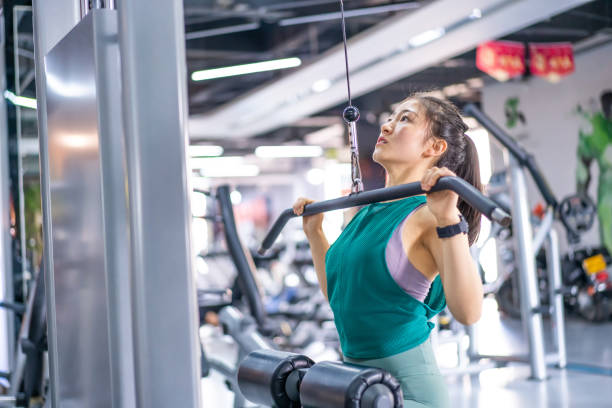 istock Young Asian female strength training in the gym 1282806699