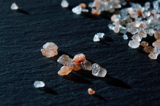 istock crystals of pink salt. 1282808282