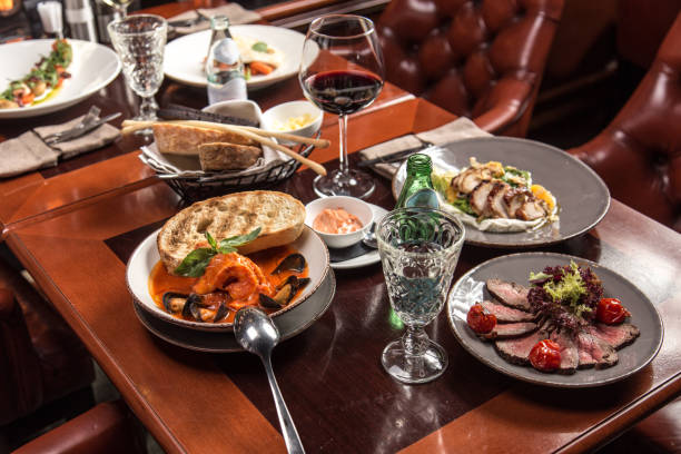 Gourmet meals assorted set on wooden table Buffet at restaurant top view