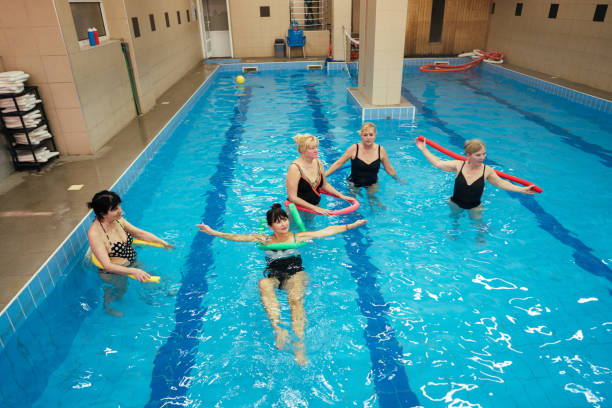 istock Active senior women relaxing in the pool 1282818523