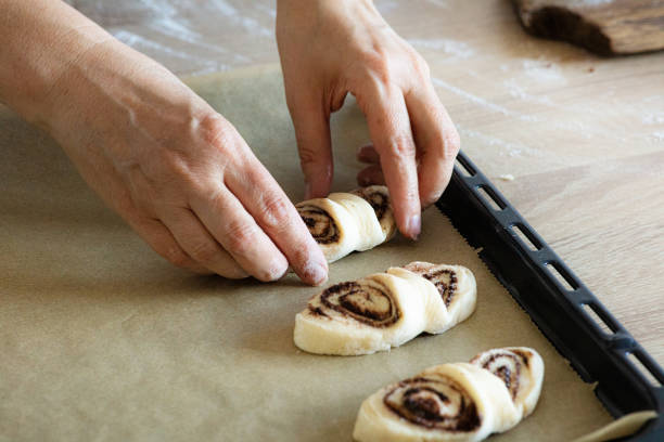 istock process of making yeast dough sweet rolls 1282820220