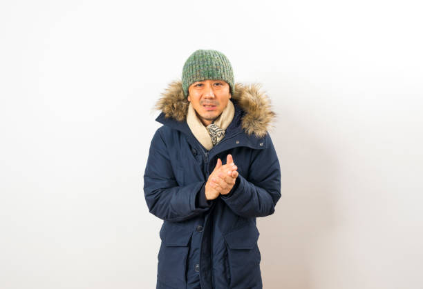 istock Handsome asian man dressed with winter clothing 1282820356