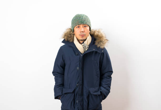 istock Handsome asian man dressed with winter clothing 1282820361