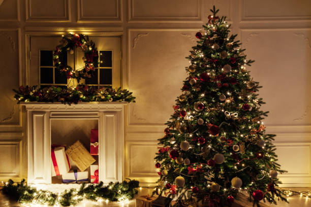 istock Light garland Christmas tree decor presents new year night interior 1282821244