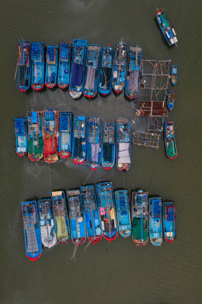 istock Boats are nailing on river before the storm 1282821356