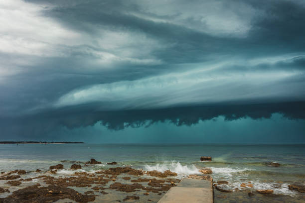 istock Coast Pier and Sea Shelf Cloud 1282821422