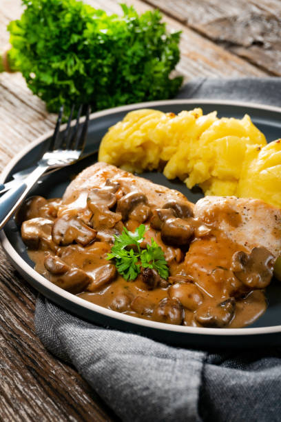 istock Grilled chicken breast with mushroom sauce. 1282821564