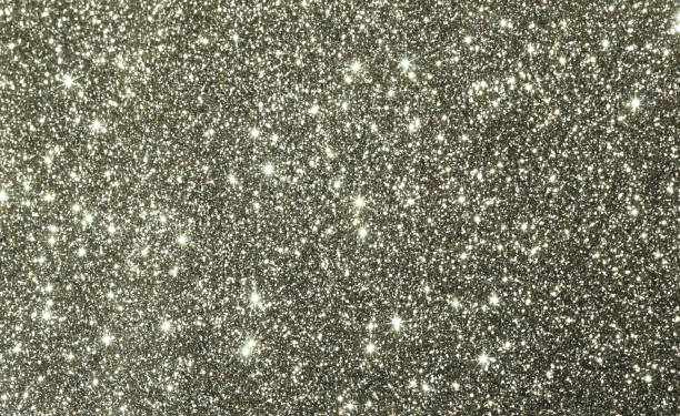 istock Christmas silver sparkle background . Glitter texture .  Festive, Xmas, holiday, party  abstract backdrop with copy space. 1282822617