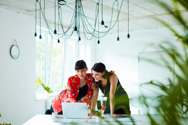 istock Beautiful, elegance women in the creative office 1282824093