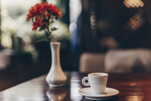 istock cup of coffee and flowers 1282824270