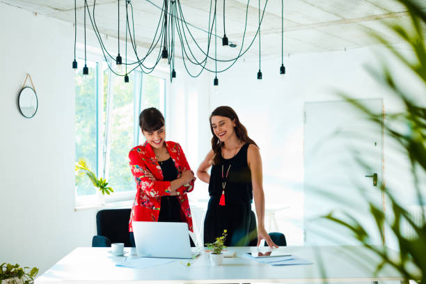 istock Female coworkers in the creative office 1282825001