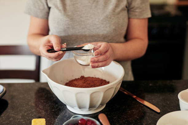 das süße leben leben - sugar kitchen utensil measuring spoon spoon stock-fotos und bilder
