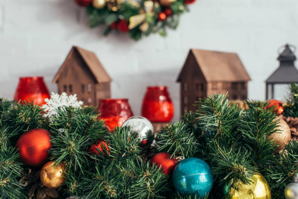 istock colorful christmas balls on green pine with blurred background 1282826393
