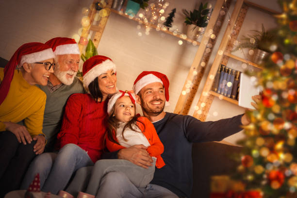 istock Christmas family with digital tablet 1282827419