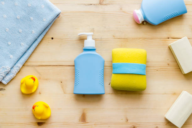 istock Baby cosmetic items with ducks rubber toy, from above 1282828879