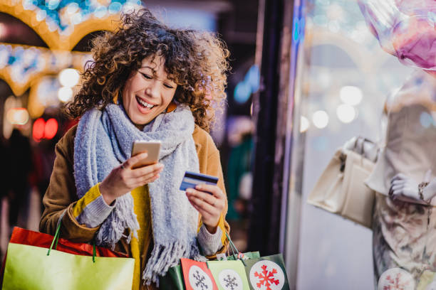 istock Young woman shopping for Christmas 1282829585