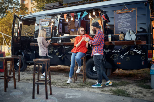 istock people at opening mobile fast food restaurant on wheels 1282829637