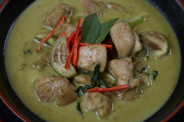 istock Thai green curry in a bowl on dark background. 1282829698