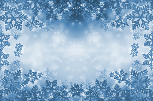 Winter card with snowflakes. Blue Christmas background for design. Space for text, copy-space.