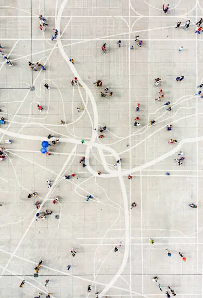 Photo of Crowd standing on top of city map