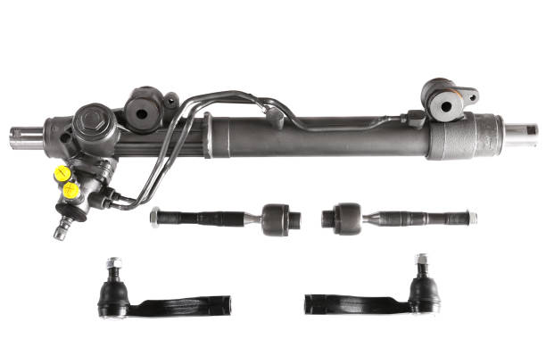 Power steering rack Power steering rack with a tie rods and a tie rods ends isolated over white background pinion stock pictures, royalty-free photos & images