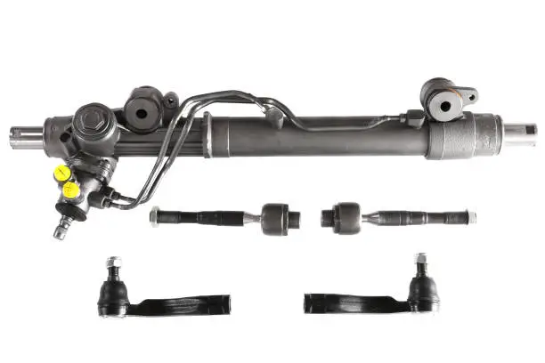 Power steering rack with a tie rods and a tie rods ends isolated over white background