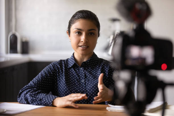 istock Young Indian female vlogger shoot live broadcast 1282833230