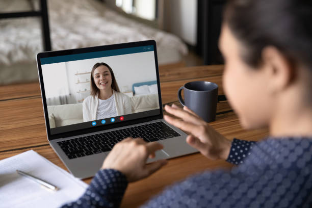 istock Woman speak on video call with colleague 1282835166