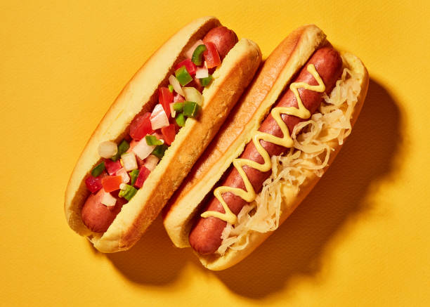 Hero Hot Dogs Hot Dogs on Yellow hot dog stock pictures, royalty-free photos & images