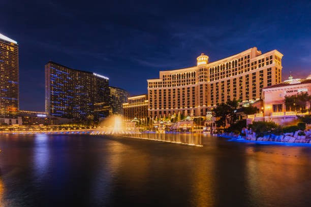 Casino in Las Vegas main attractions Fountains of Bellagio hotel with bright lights of hotels on Las Vegas Strip in Paradise, Nevada. Las Vegas, USA - September 28, 2018. bellagio stock pictures, royalty-free photos & images
