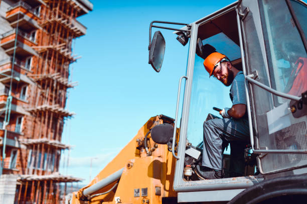 istock Buldozer Driver Focusing On His Task At Hand On Site 1282848364