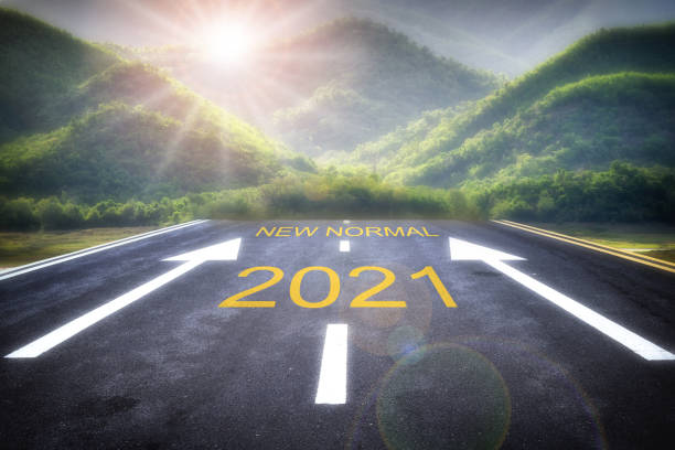 istock Start to new year 2021 new normal with sunrise 1282850381