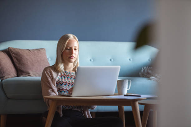 istock Young woman working from home 1282852474
