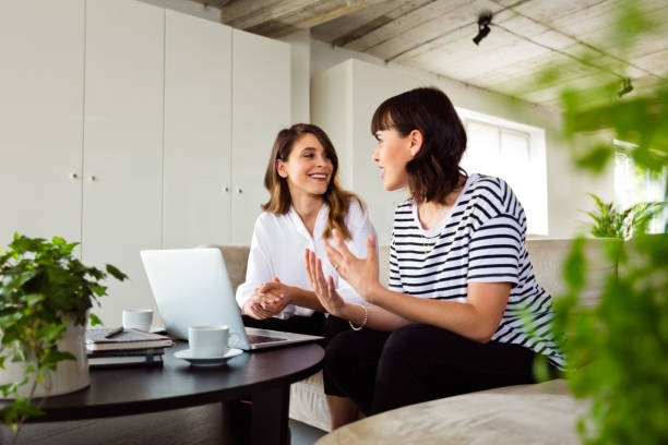 istock Young women working in the cretive office 1282854110