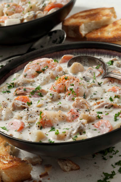 istock Seafood Chowder with Shrimp, Bay Scallops, Clams and Salmon 1282854399