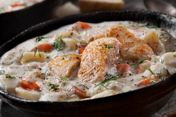 istock Butter Poached Salmon Chowder with Potatoes, Carrots and Fresh Dill 1282854944