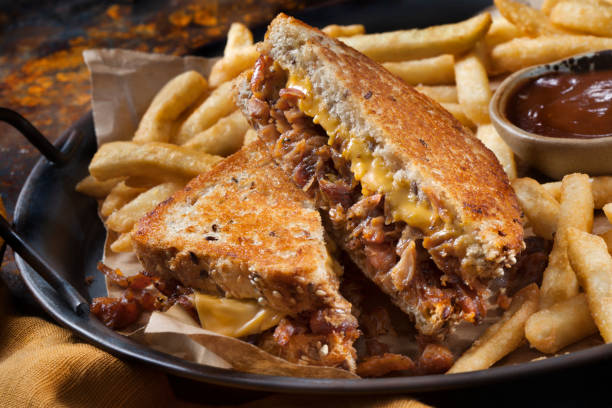 istock Pulled Pork Grilled Cheese Sandwich with Fries 1282855220