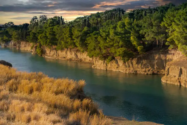 Photo of The stunning Corinth Canal connecting the Gulf of Corinth in the Ionian Sea with the Saronic Gulf in the Aegean Sea.