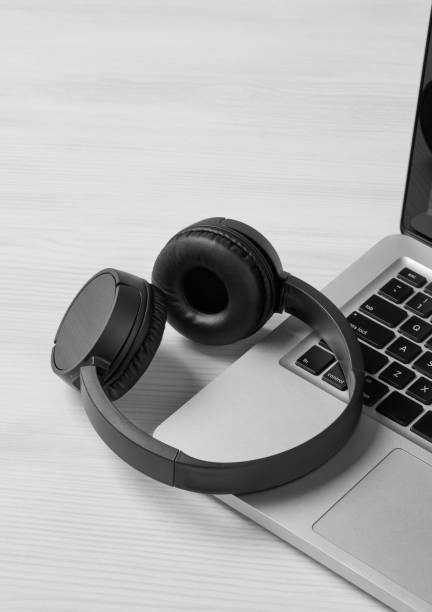 istock Headphones and laptop close-up 1282859370