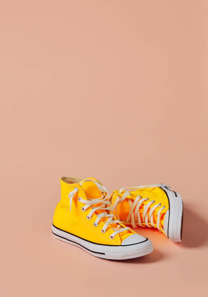 istock Yellow canvas sport shoes 1282859377