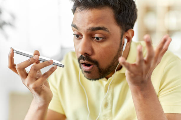 istock angry man with earphones calling on smartphone 1282859495